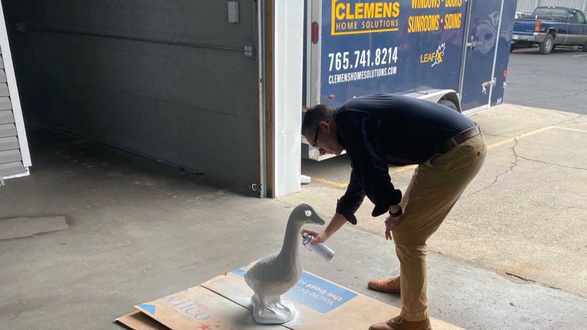 roof-repair-contractor-fixing-goose-indianapolis-clemens-paint-graphic